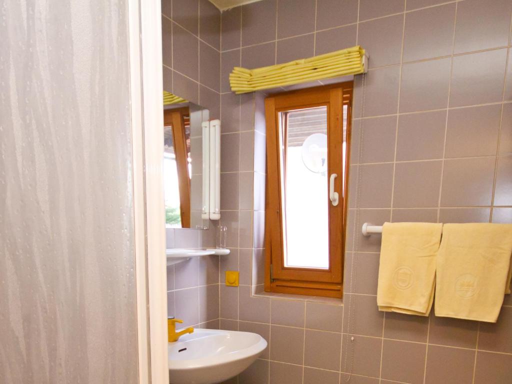 Vannituba majutusasutuses Appartements Popotnik