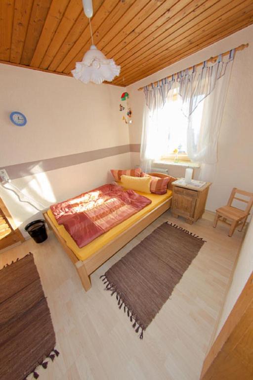 Postel nebo postele na pokoji v ubytování Huisnhof