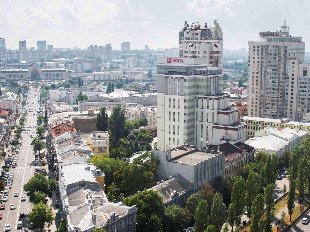 an aerial view of a city with tall buildings at ibis Kyiv City Center in Kyiv