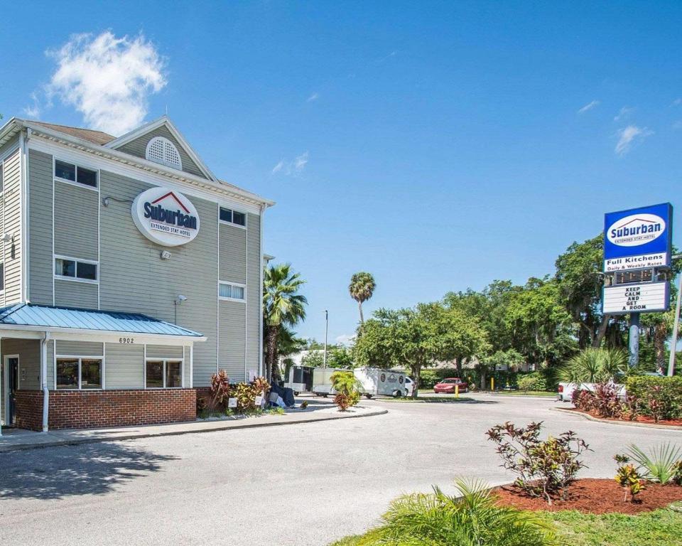 a building with a sign in front of it at Tampa Bay Extended Stay - Airport in Tampa