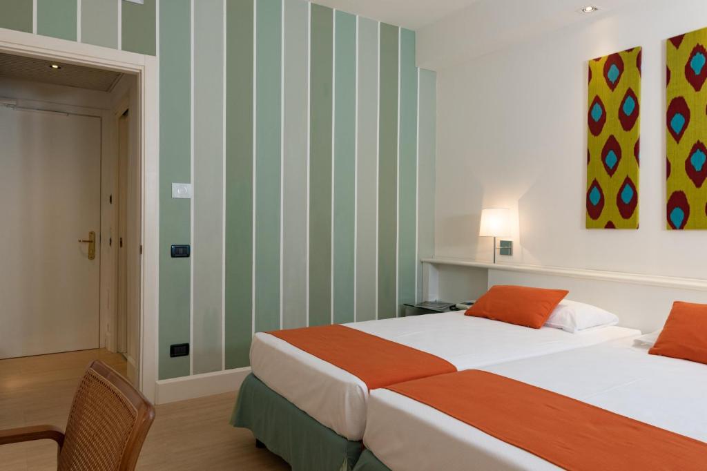Letto o letti in una camera di Art&Park Hotel Union Lido