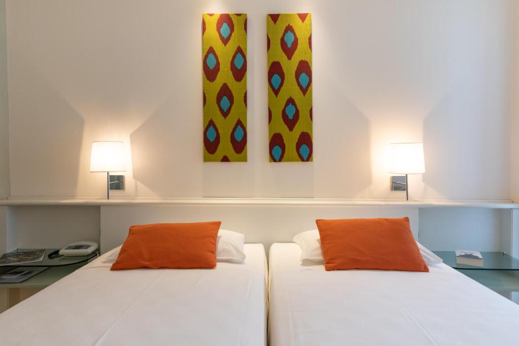 Letto o letti in una camera di Art&Park Hotel Union Lido