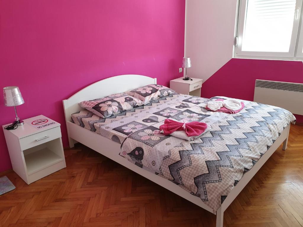 Krevet ili kreveti u jedinici u okviru objekta Apartment Centar Deluxe