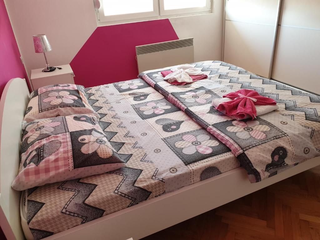 Krevet ili kreveti u jedinici u okviru objekta Apartment Centar Deluxe