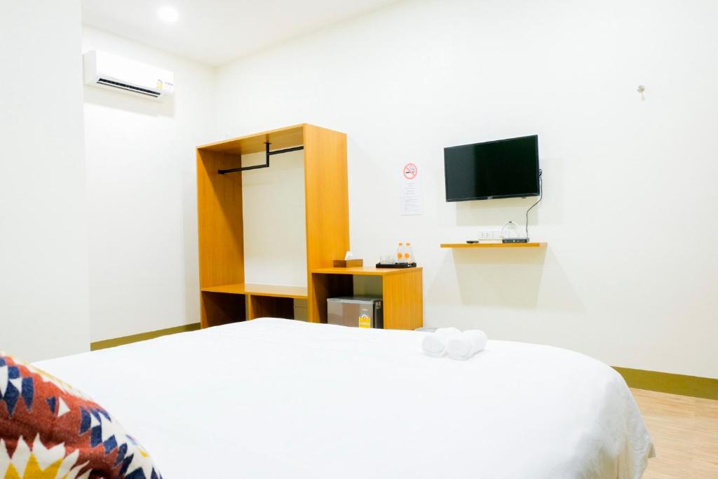 TV a/nebo společenská místnost v ubytování The Cozy Hotel