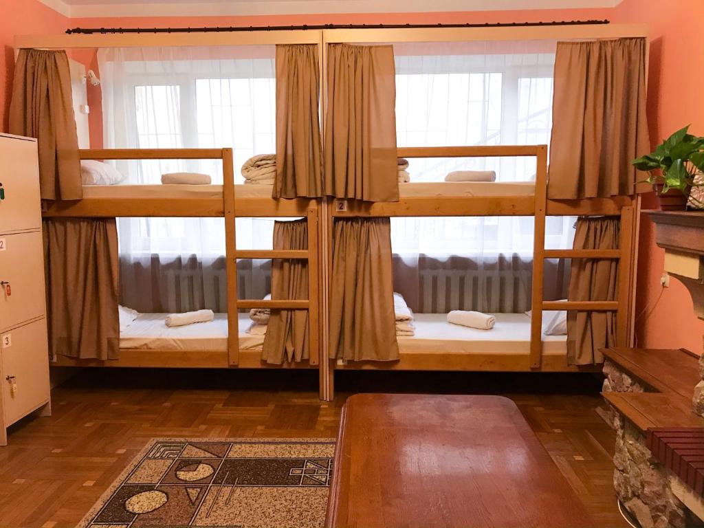 Postel nebo postele na pokoji v ubytování Pelican Guest House & Hostel