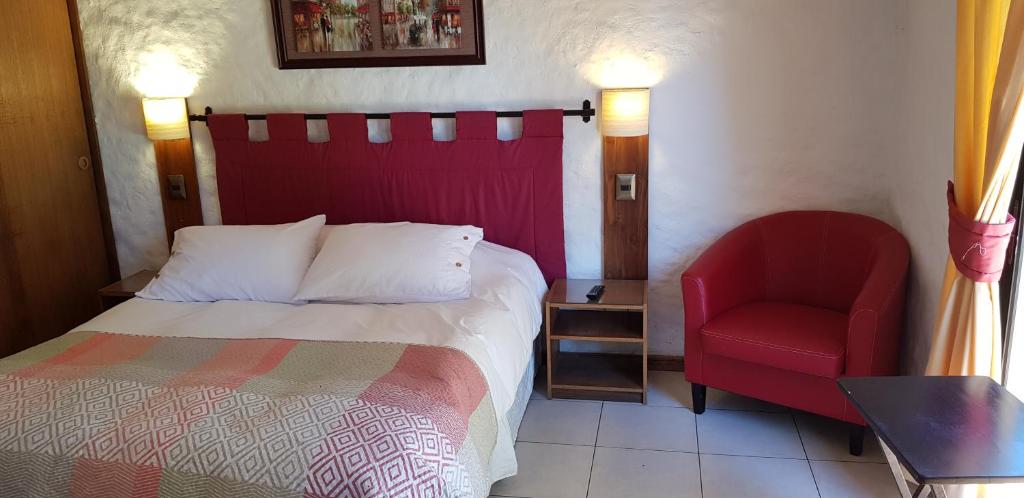 Postel nebo postele na pokoji v ubytování Stellamar Apart Hotel