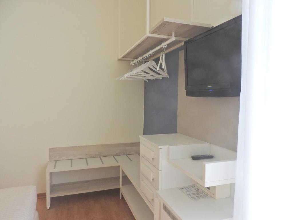 TV a/nebo společenská místnost v ubytování Hotel Aristeo