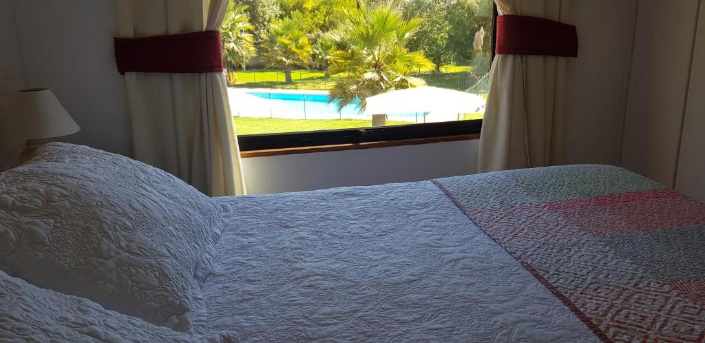 Postel nebo postele na pokoji v ubytování Stellamar Apart Hotel