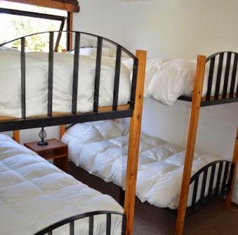 Postel nebo postele na pokoji v ubytování Stellamar Apart Hotel