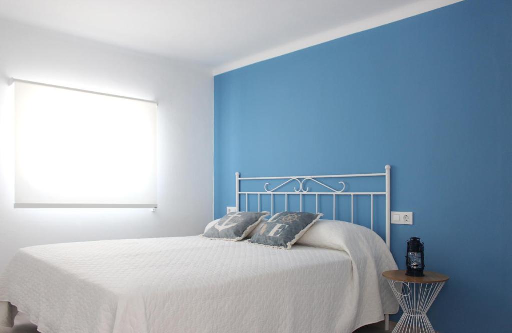 Posteľ alebo postele v izbe v ubytovaní Villa La Costa - 3 apartamentos turísticos