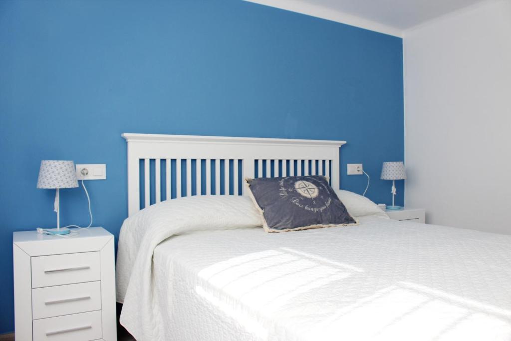 Posteľ alebo postele v izbe v ubytovaní Villa La Costa - 3 apartamentos turísticos