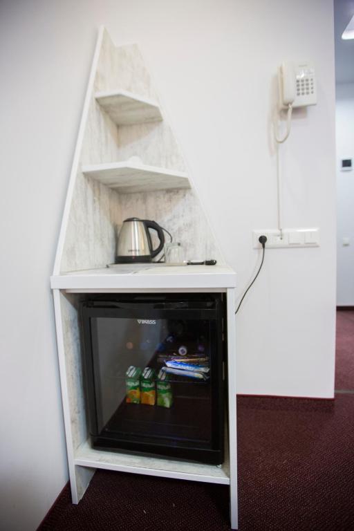 Kuchyň nebo kuchyňský kout v ubytování Hobby Hotel
