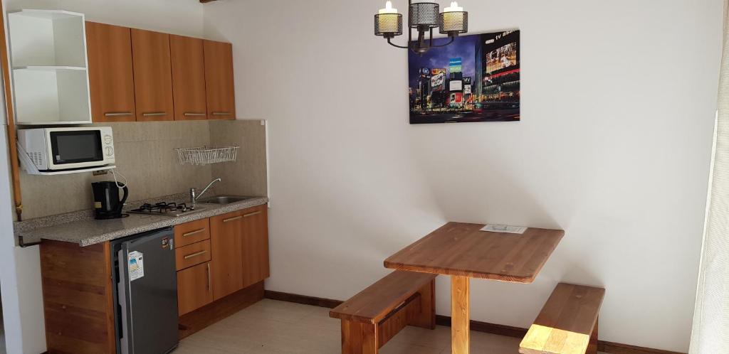 Kuchyň nebo kuchyňský kout v ubytování Stellamar Apart Hotel