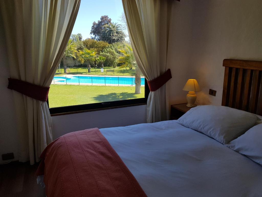 Postel nebo postele na pokoji v ubytování Stellamar Apart Hotel