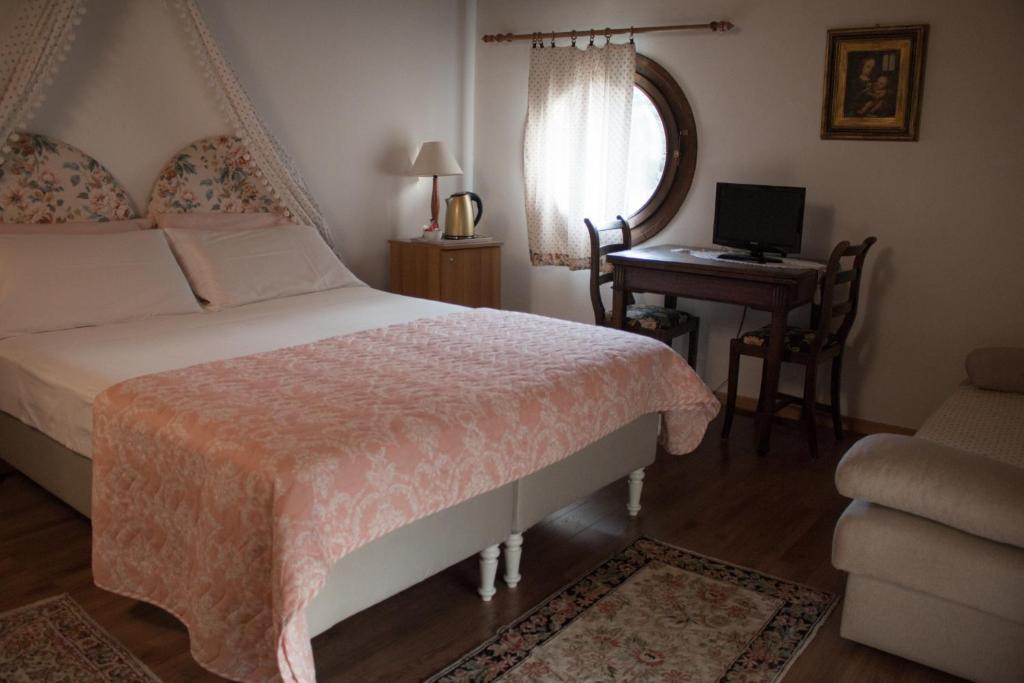 Postel nebo postele na pokoji v ubytování Al Rustico
