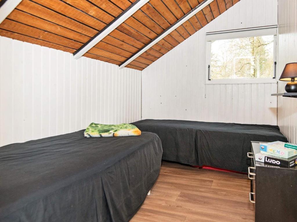 Postel nebo postele na pokoji v ubytování Holiday home Ansager XII