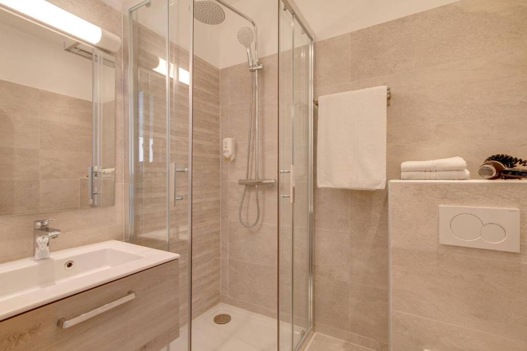 Koupelna v ubytování Hotel Select