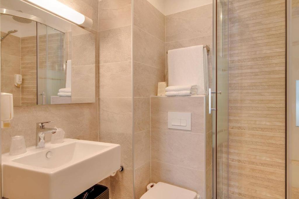 Koupelna v ubytování Hotel Select