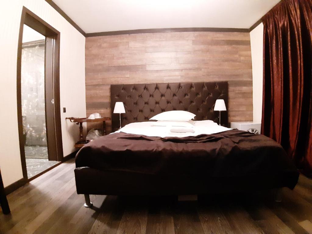 Postel nebo postele na pokoji v ubytování Pension Casa Wenge