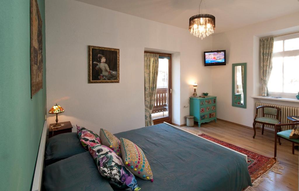 Postel nebo postele na pokoji v ubytování Zenana Boutique Hotel