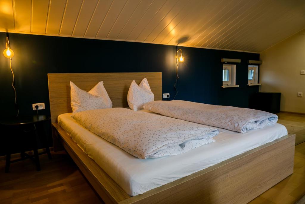 Postel nebo postele na pokoji v ubytování NORDIC Home