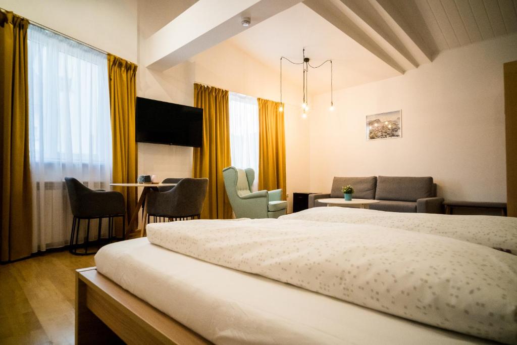 Postel nebo postele na pokoji v ubytování NORDIC Home