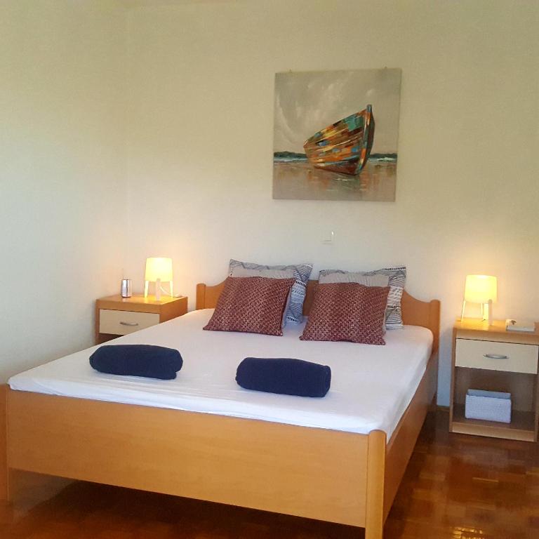 Postel nebo postele na pokoji v ubytování Studio Apartments Marra & Kech