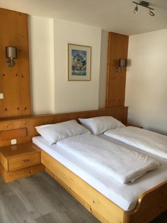 Posteľ alebo postele v izbe v ubytovaní Landhaus Holzereck