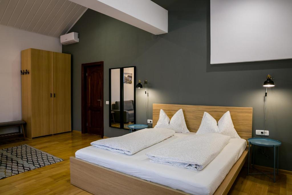 Postel nebo postele na pokoji v ubytování NORDIC Home