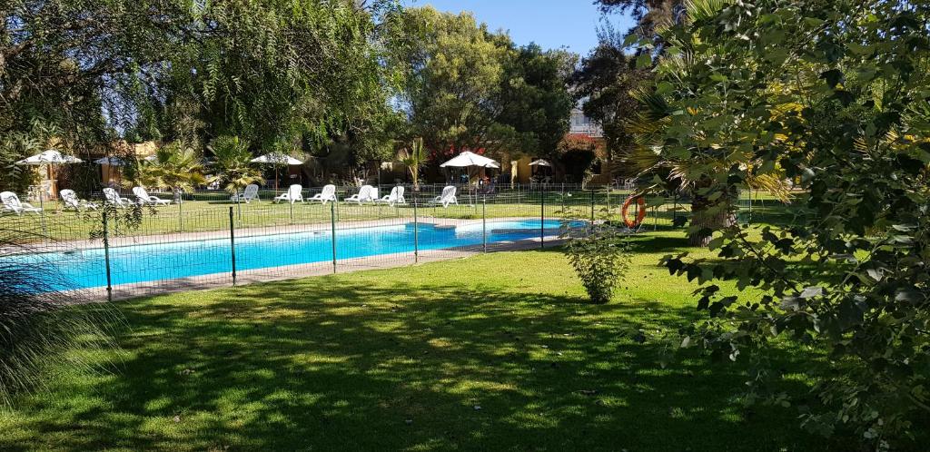 Bazén v ubytování Stellamar Apart Hotel nebo v jeho okolí