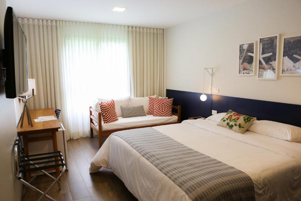 Cama ou camas em um quarto em Hotel do Bosque ECO Resort