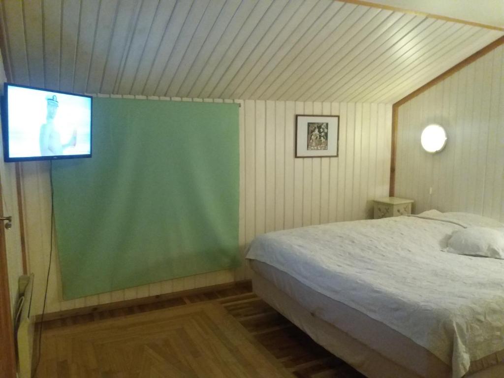 Postel nebo postele na pokoji v ubytování White Villa