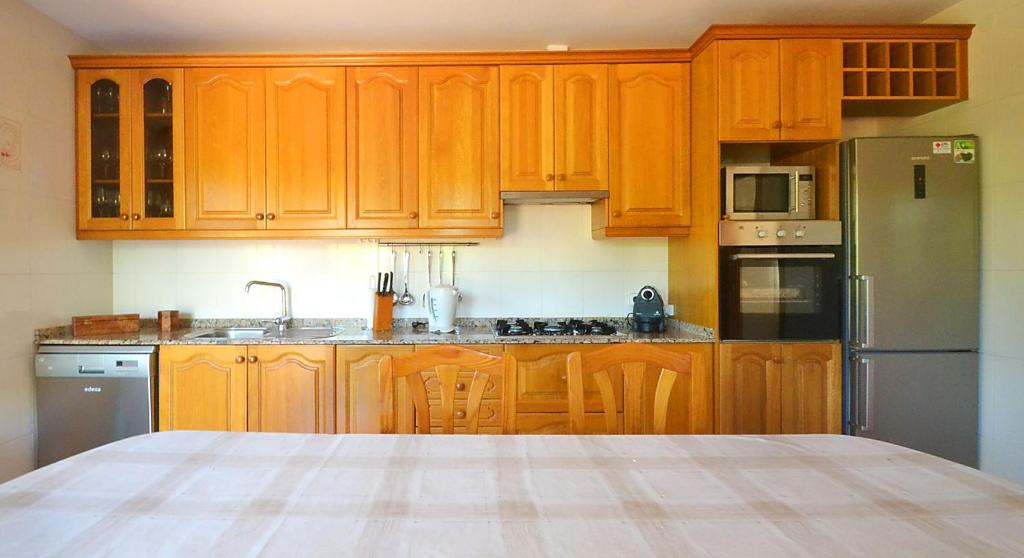 Kuchyň nebo kuchyňský kout v ubytování Caricuao house