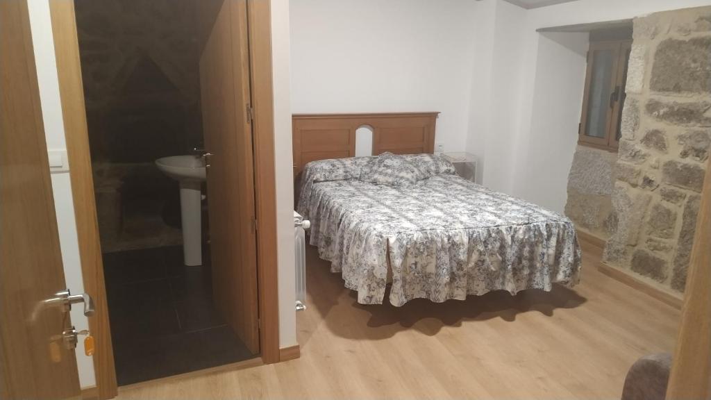Postel nebo postele na pokoji v ubytování Casa Dos Fuelles