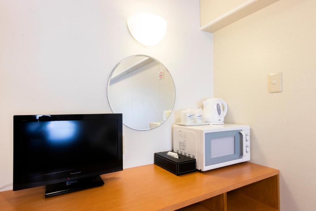 TV a/nebo společenská místnost v ubytování Y' RISE TO HOTEL Miyakojima