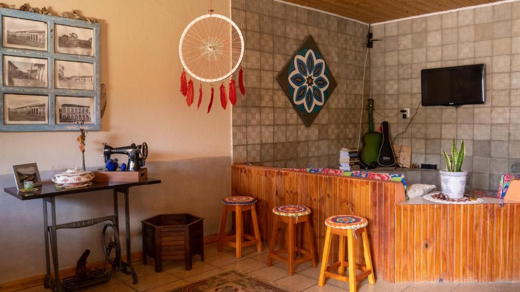 Uma TV ou centro de entretenimento em Casa di Vó
