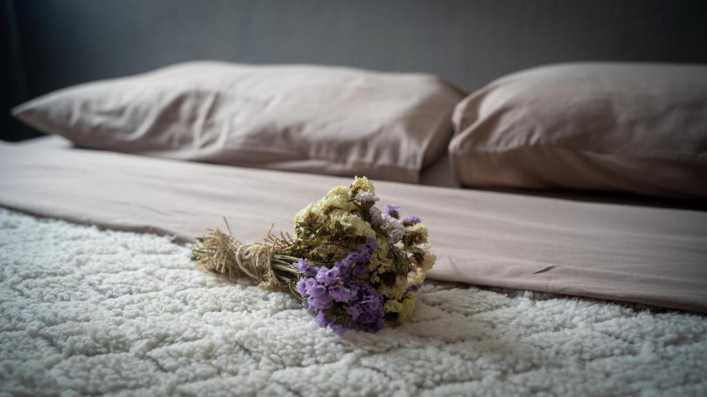Cama ou camas em um quarto em Casa di Vó
