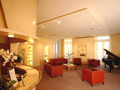 Posezení v ubytování Logis Grand Hôtel Des Bains