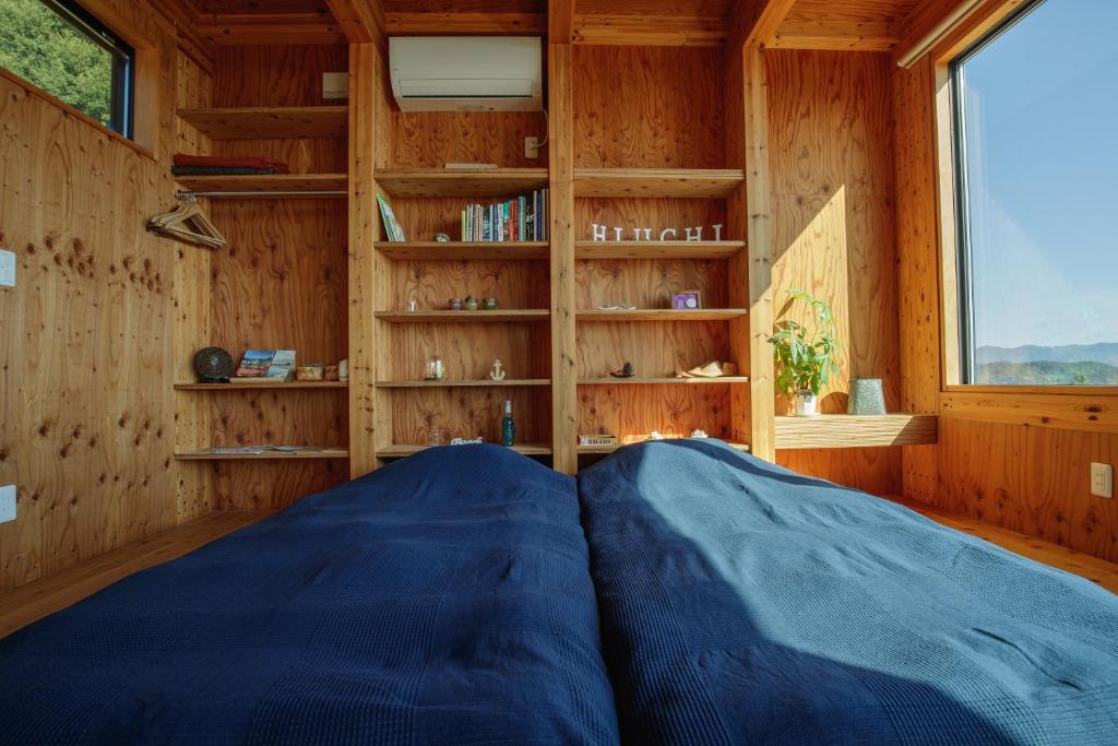 Postel nebo postele na pokoji v ubytování Hiuchi