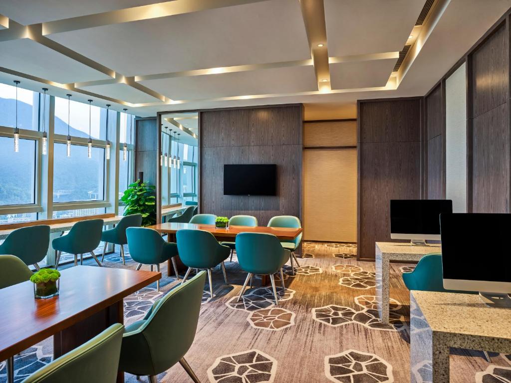 TV a/nebo společenská místnost v ubytování Hyatt Regency Shenzhen Yantian