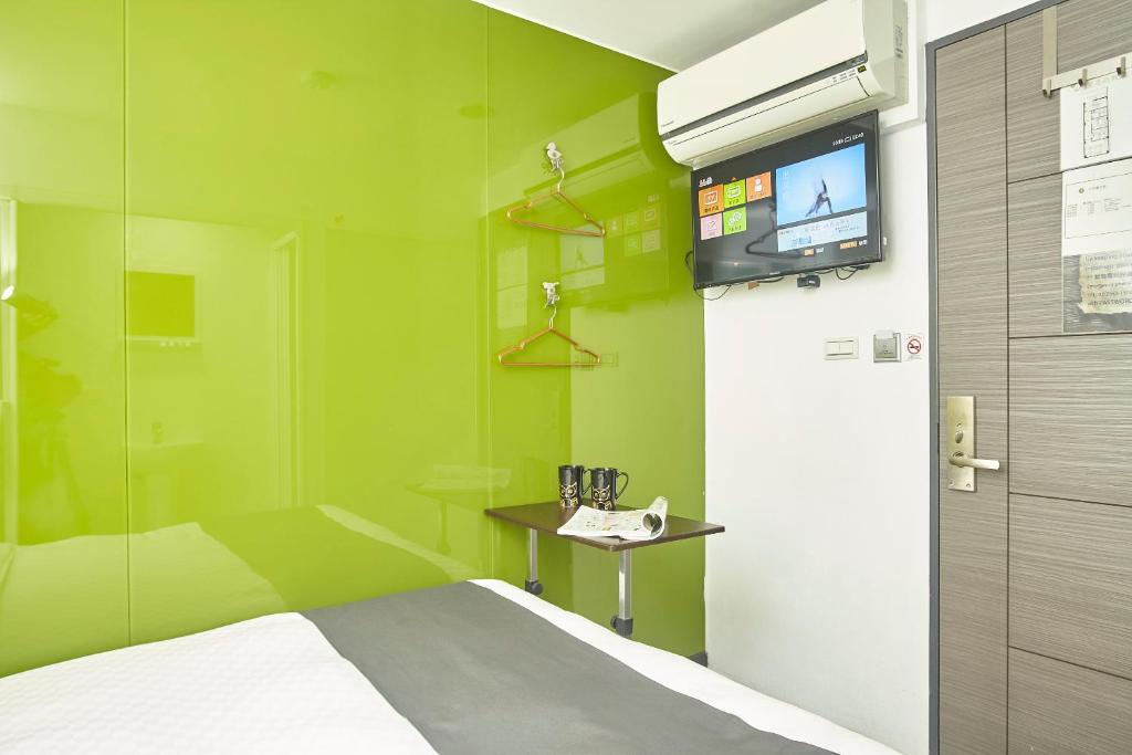 TV a/nebo společenská místnost v ubytování T.O. Hotel Chengde