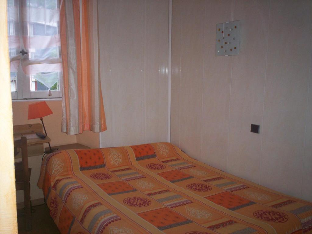 Postel nebo postele na pokoji v ubytování Pension Saint Antoine