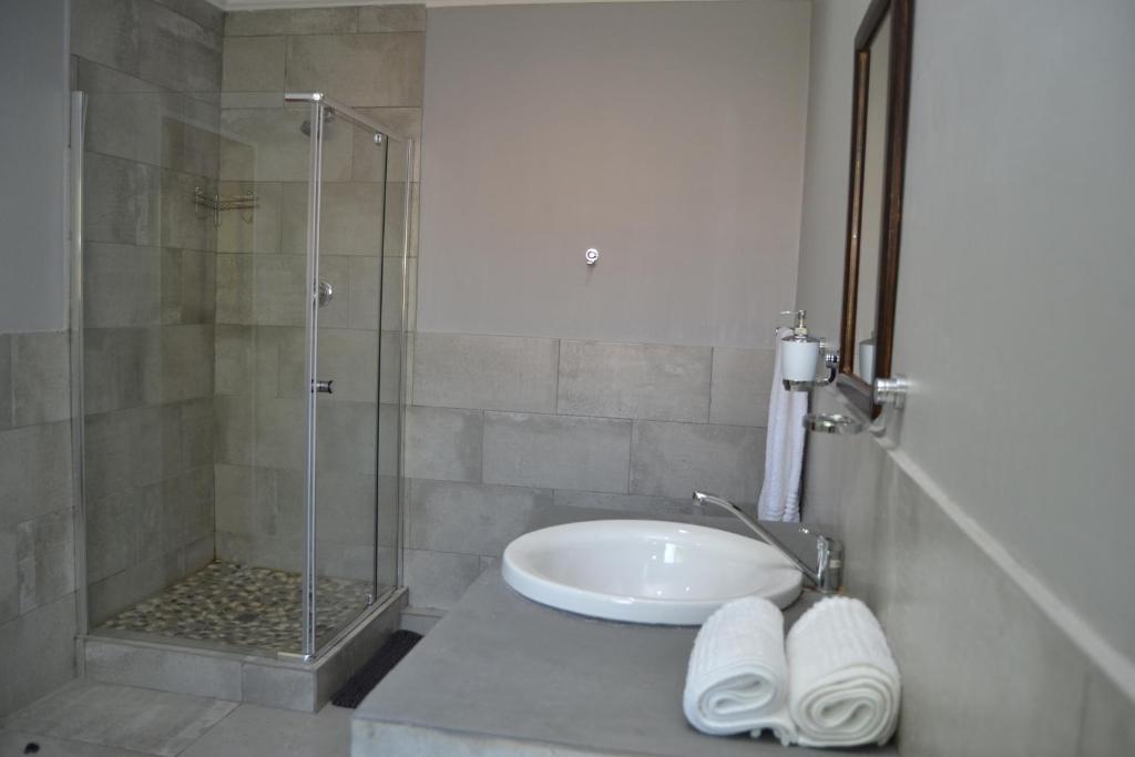 Koupelna v ubytování African Sands Guesthouse LOAD SHEDDING FREE