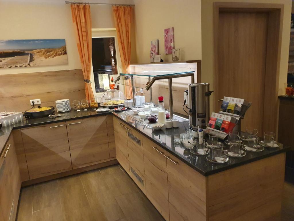 Kuchyň nebo kuchyňský kout v ubytování Hotel Bohlje