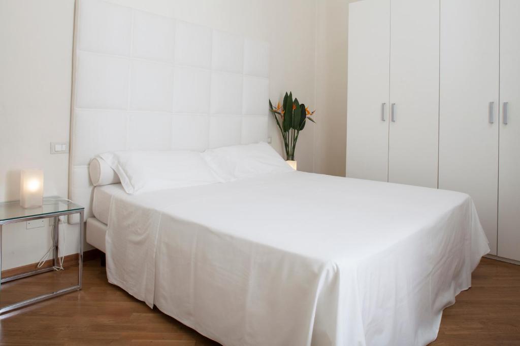 Postel nebo postele na pokoji v ubytování Exclusive Aparthotel La Reunion