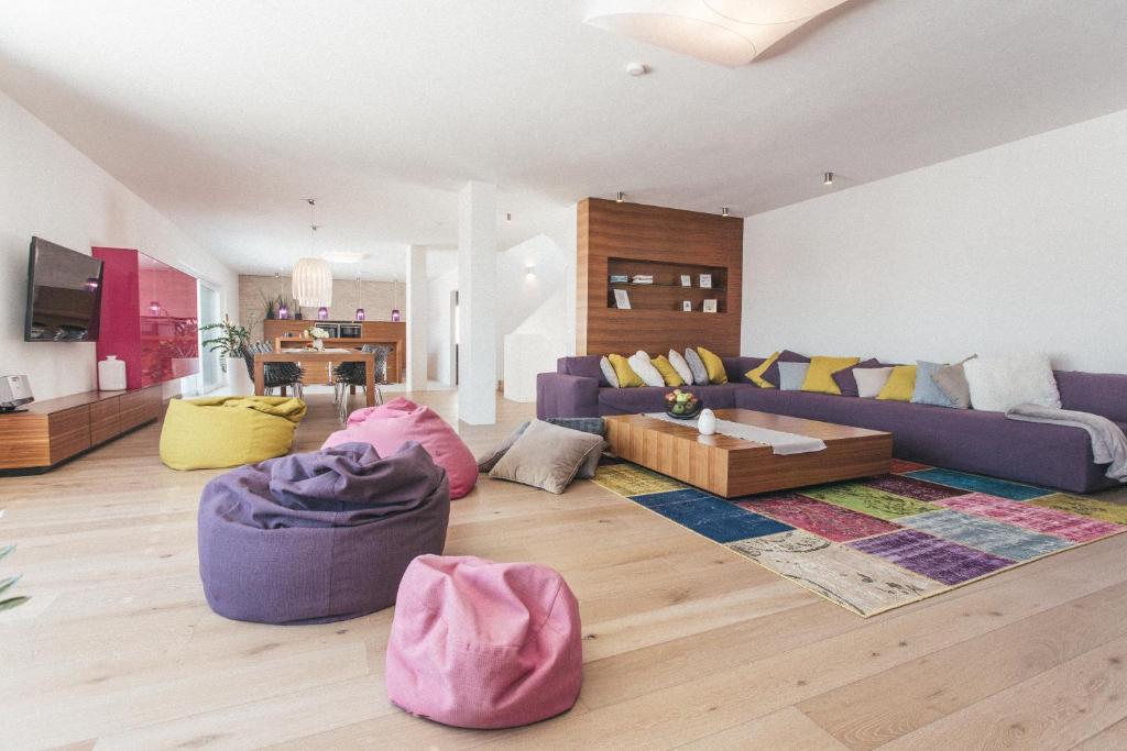 Posezení v ubytování Glücksthaler by AA Holiday Homes - SchladmingDachstein