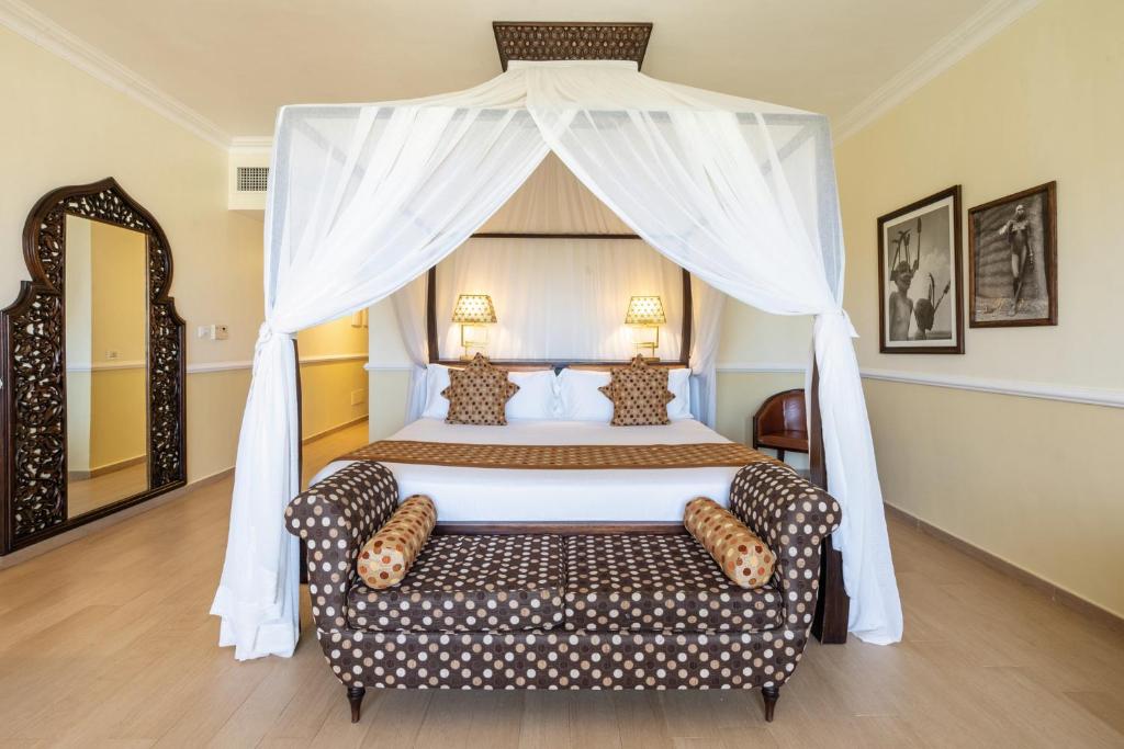 Postel nebo postele na pokoji v ubytování Riu Palace Zanzibar - All Inclusive - Adults Only