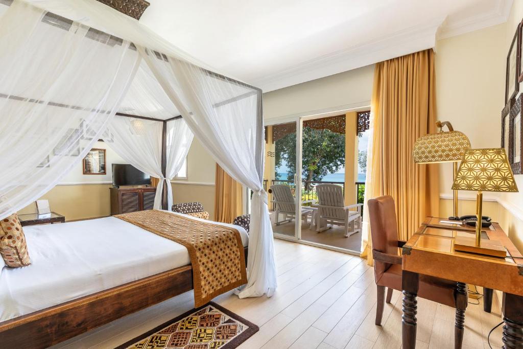 Postel nebo postele na pokoji v ubytování Riu Palace Zanzibar - All Inclusive - Adults Only