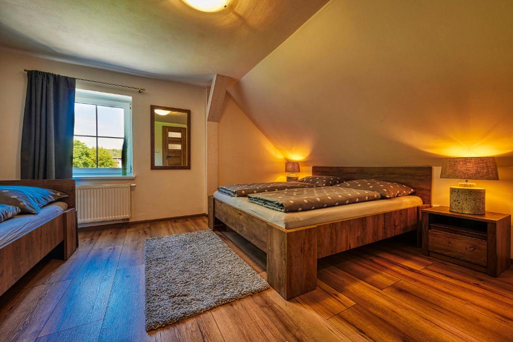 Postel nebo postele na pokoji v ubytování Na Rozcestí Frýdlant